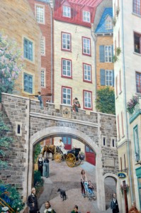 A huge mural painted in the center of old town. Feels like you can walk right into the street and meet the people there. 